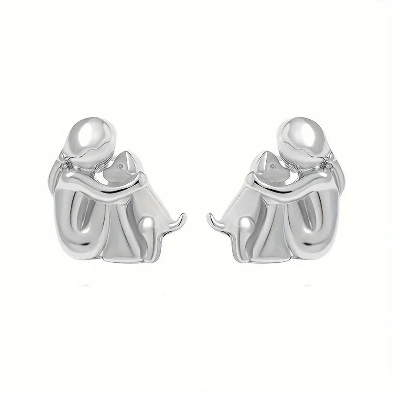Zweifarbige Huggie-Ohrringe in Silber und Gold