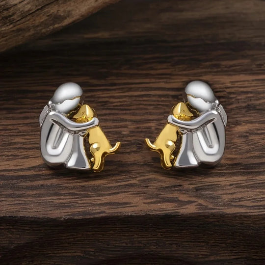 Zweifarbige Huggie-Ohrringe in Silber und Gold